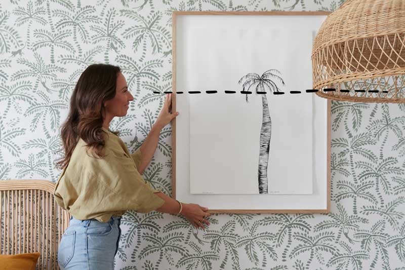 How to hang artwork between two doors